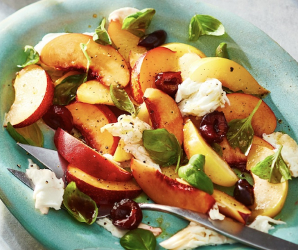 Bowl of stone fruit caprese salad