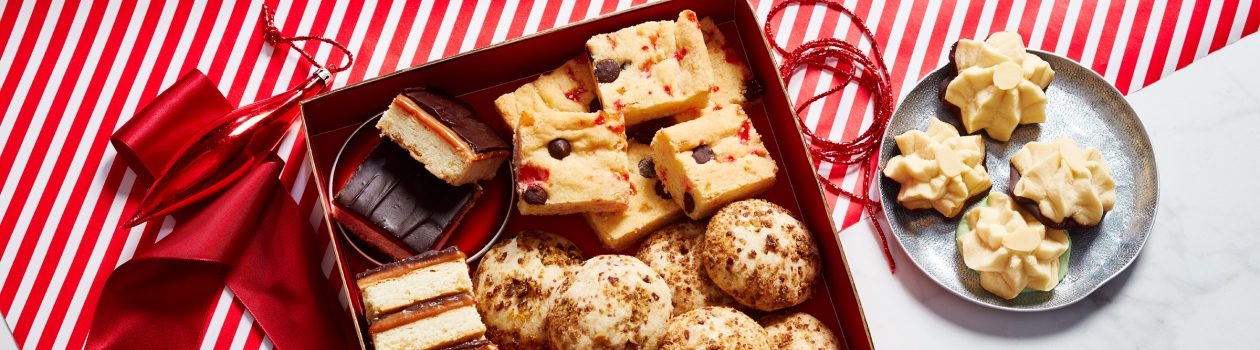 Shortbread cookies being lifted with a spatula